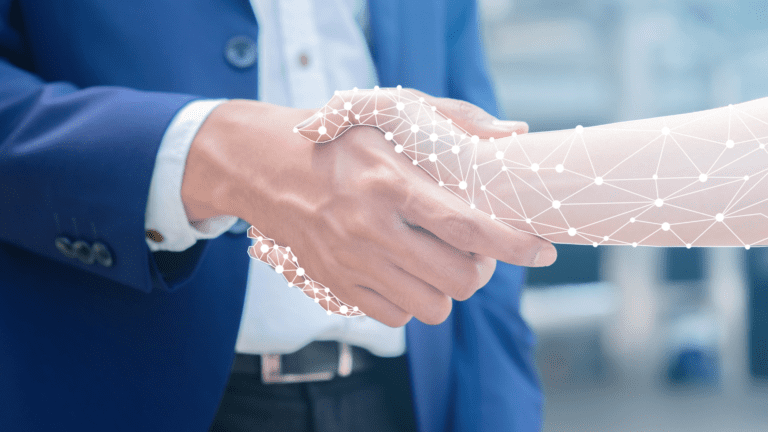 Aperto de mãos entre executivo e braço digital em rede, simbolizando parceria da Embrapii com a Business Finland em inovação tecnológica.