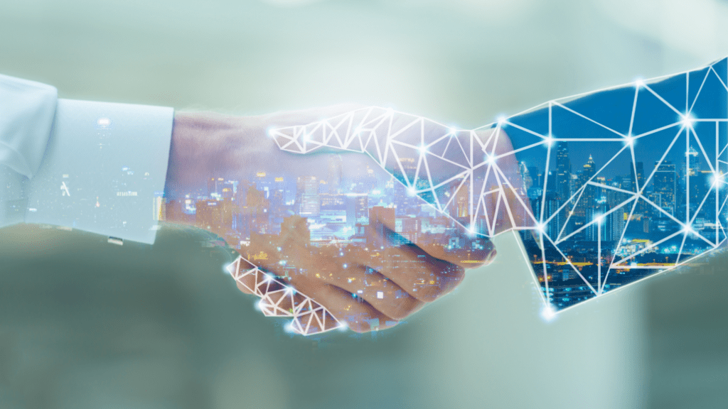 Aperto de mãos com sobreposição digital representando parceria — Embrapii e BNDES investem R$ 145 milhões em PD&I