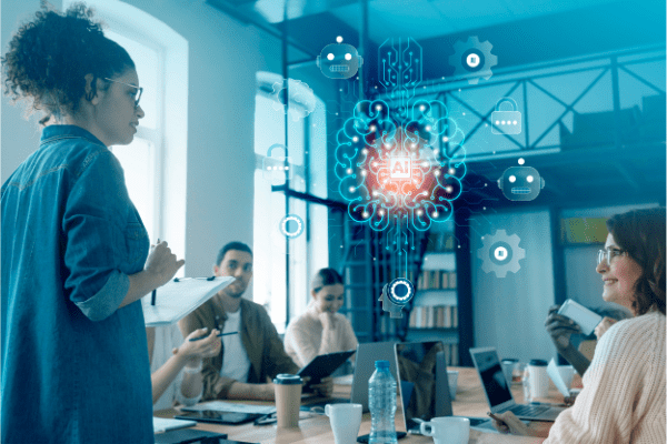 Equipe em reunião criativa com holograma de inteligência artificial — inovação aberta, colaboração entre times e transformação digital nas empresas.